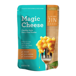 Package of Magic Cheese by Living Jin Foods with a forkful of cheese on a white background